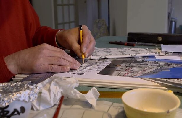 Kees Momma bezig met stadhuis van Gouda.