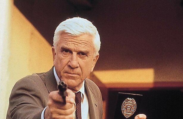 Leslie Nielsen in The Naked Gun: From the Files of Police Squad!