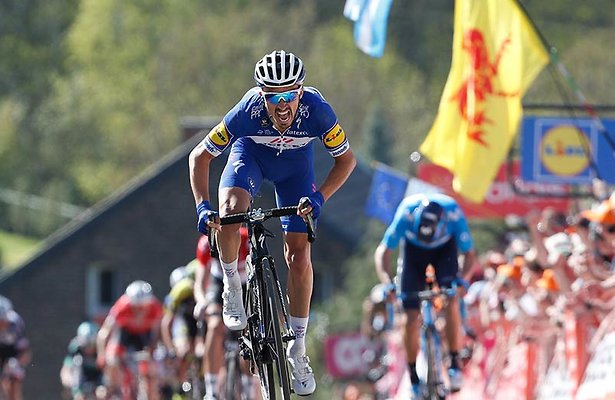 Peloton tegen Muur op