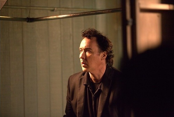 John Cusack en de tas