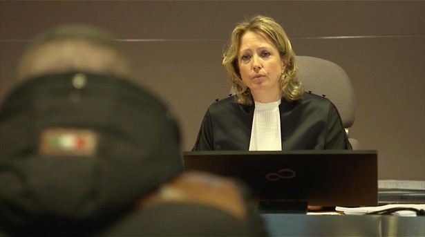 Burger voor het hekje