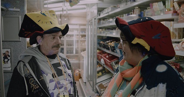 Markante winkelier op wielen