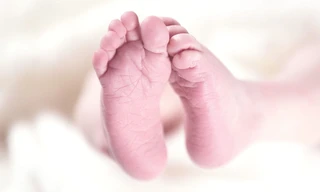 Vier handen op één buik