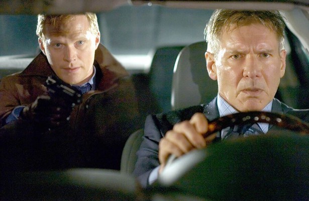 Paul Bettany en Harrison Ford in Firewall