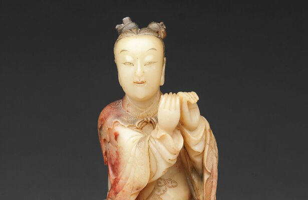 Beeld van speksteen van Chinese mythologische figuur Han Xiangzi