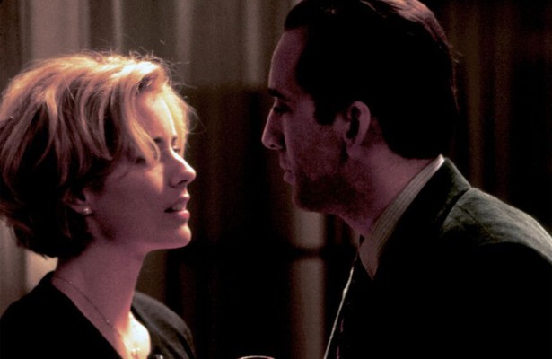 Téa Leoni en Nicolas Cage in The Family Man