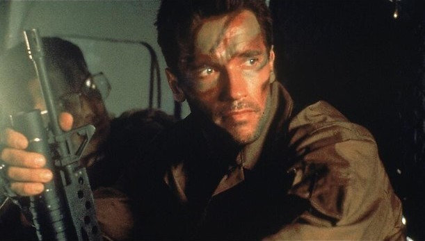 Arnold Schwarzengger vecht met een monster